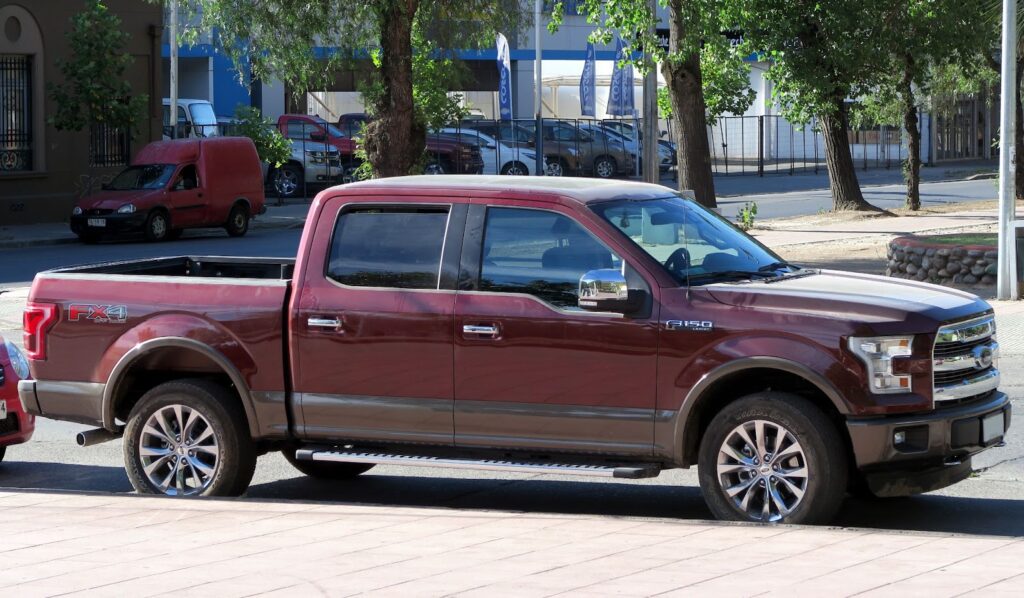 Ford F-150 Crew Cab in Magma Red color